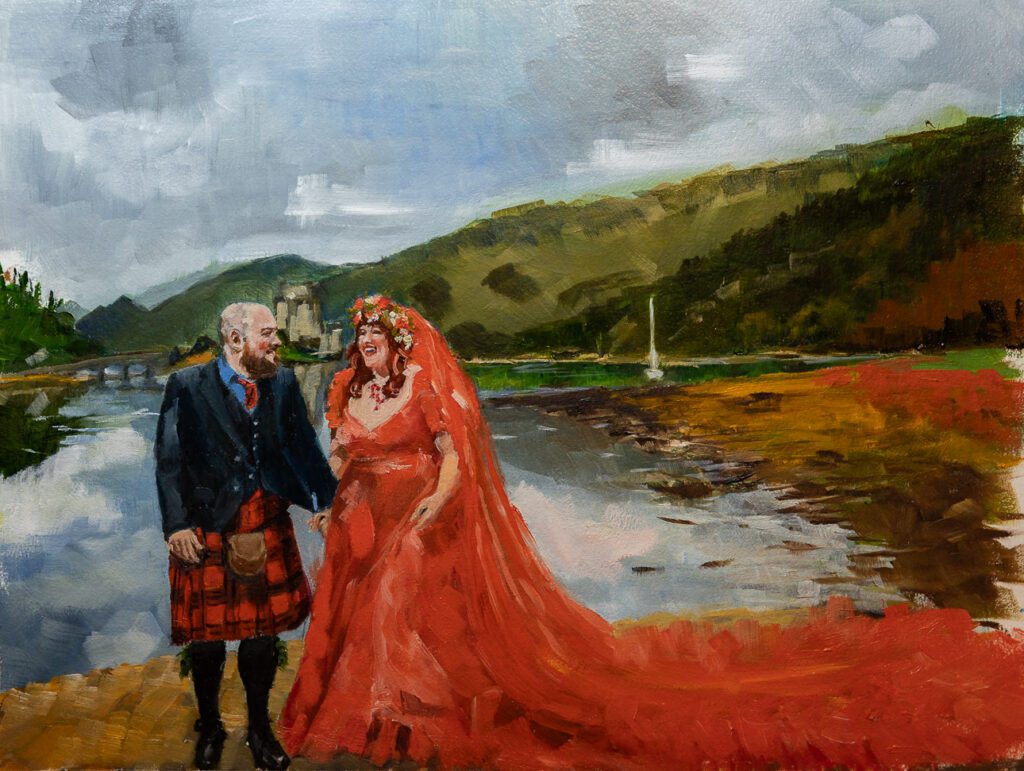 Wedding couple painting at Eilean Donan Castle Scotland. Groom wears kilt and bride red gown. Eilean Donan Castle and yacht in background